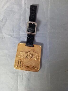 VINTAGE IH BRASS PAY LINE WATCH FOB RISH